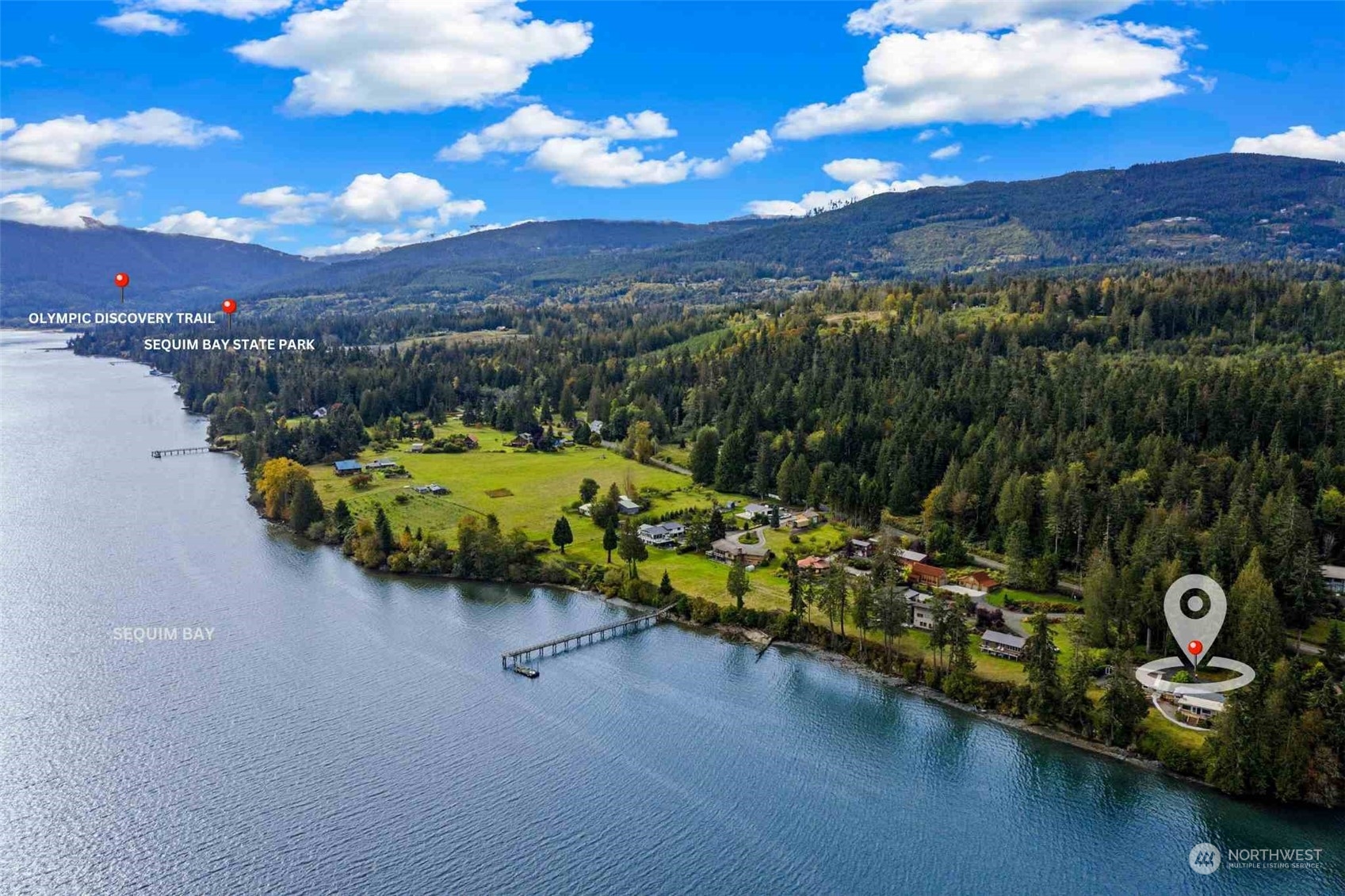 3217 West Sequim Bay Road Sequim, WA 98382 - Photo 37 of 40 an aerial view of a house with a garden and lake view