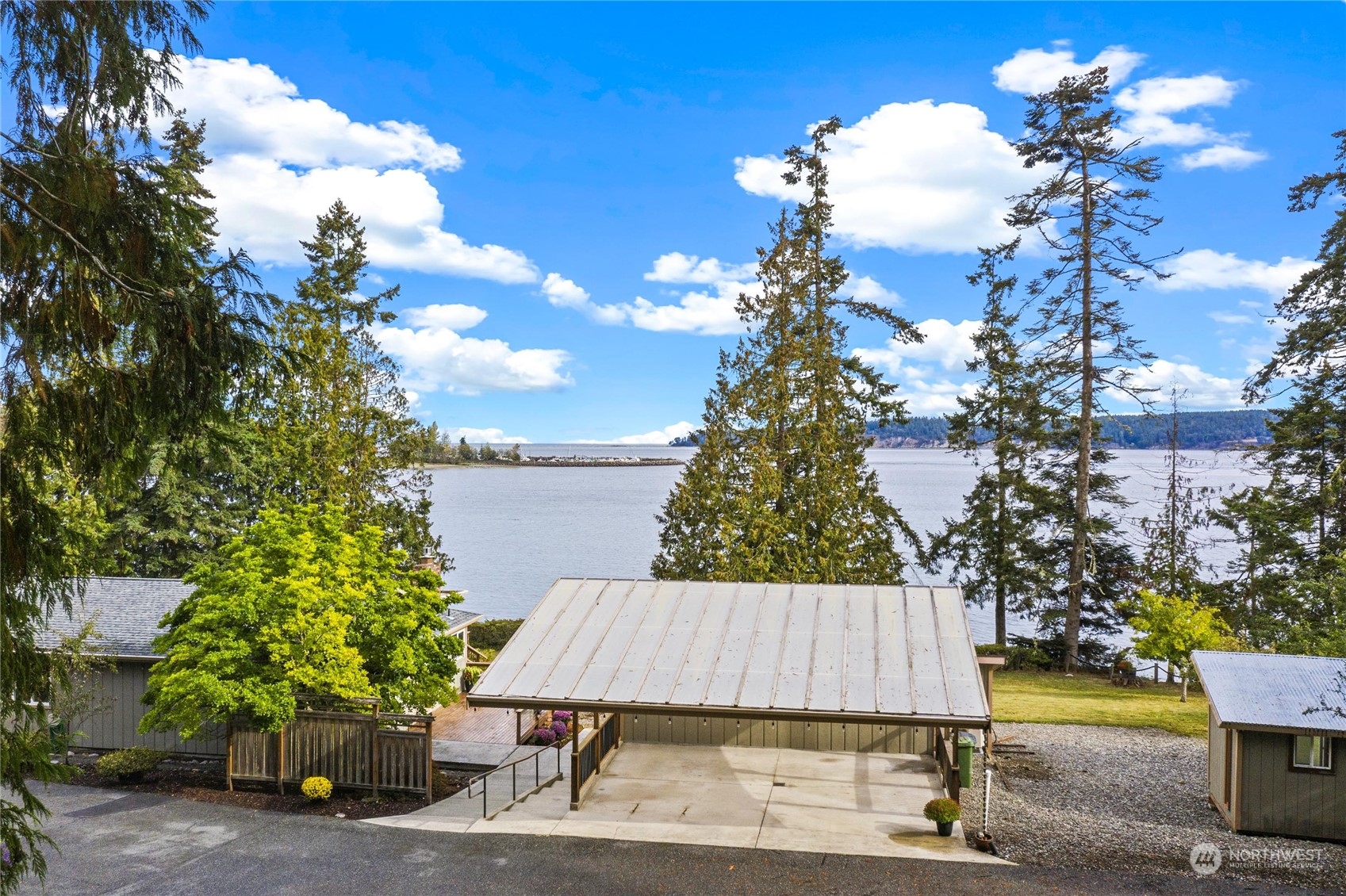3217 West Sequim Bay Road Sequim, WA 98382 - Photo 40 of 40 a view of backyard with a patio and plants