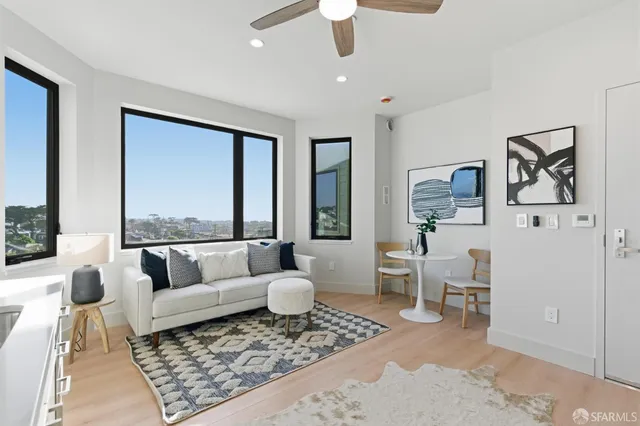 a bath room with a toilet a sink and a bath tub