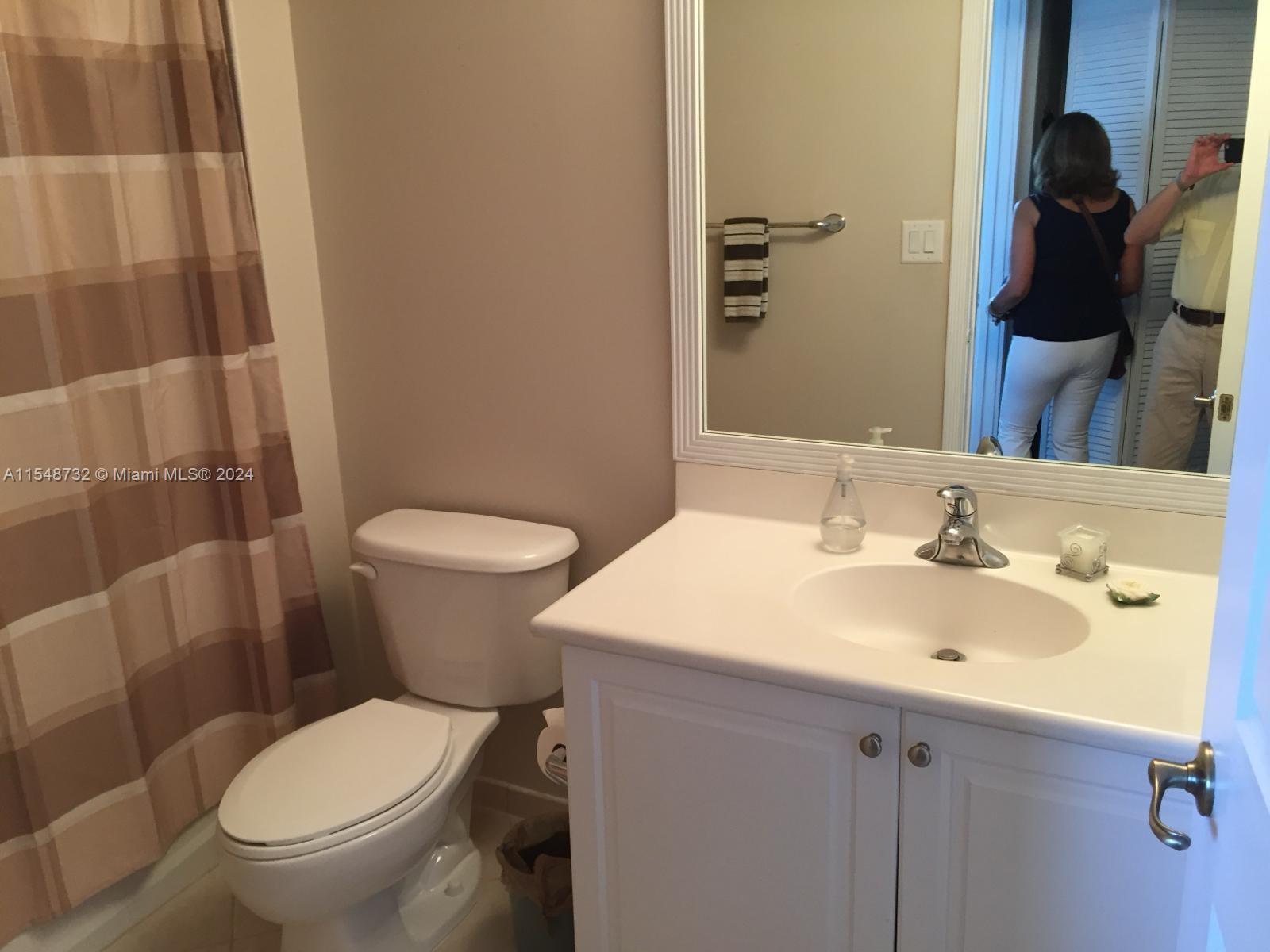 Kendall Miami, FL 33176 - Photo 13 of 15 a bathroom with a sink and a toilet