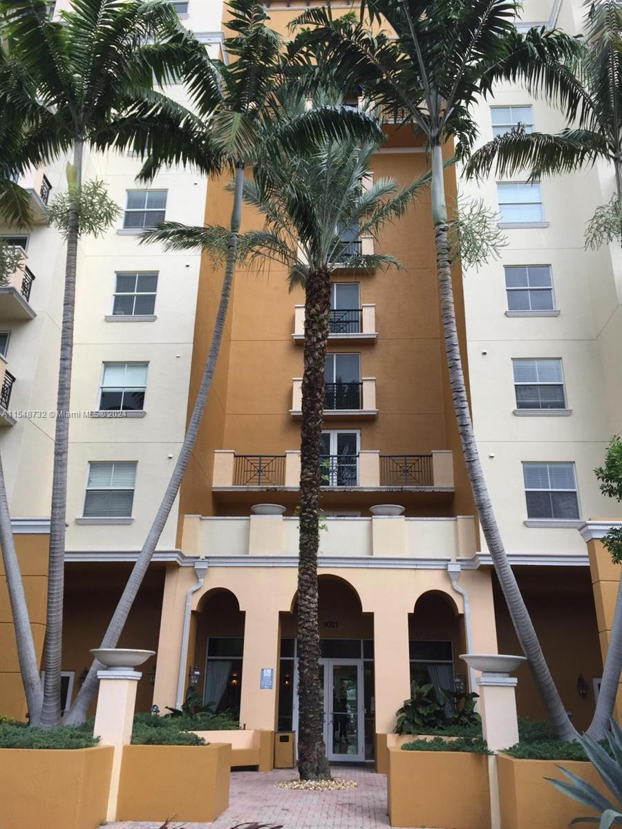 Kendall Miami, FL 33176 - Photo 2 of 15 a front view of multi story residential apartment building with yard and entryway