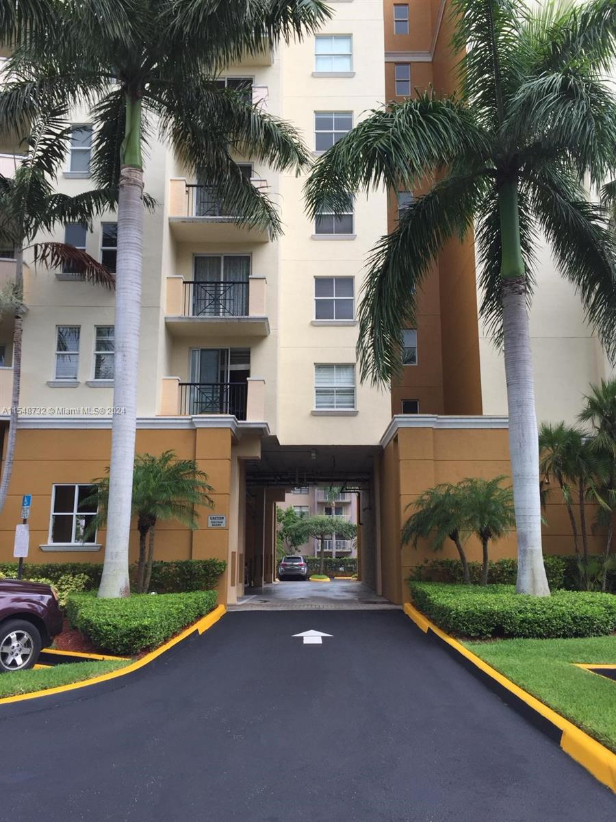 Kendall Miami, FL 33176 - Photo 3 of 15 a view of a house with a yard and palm trees
