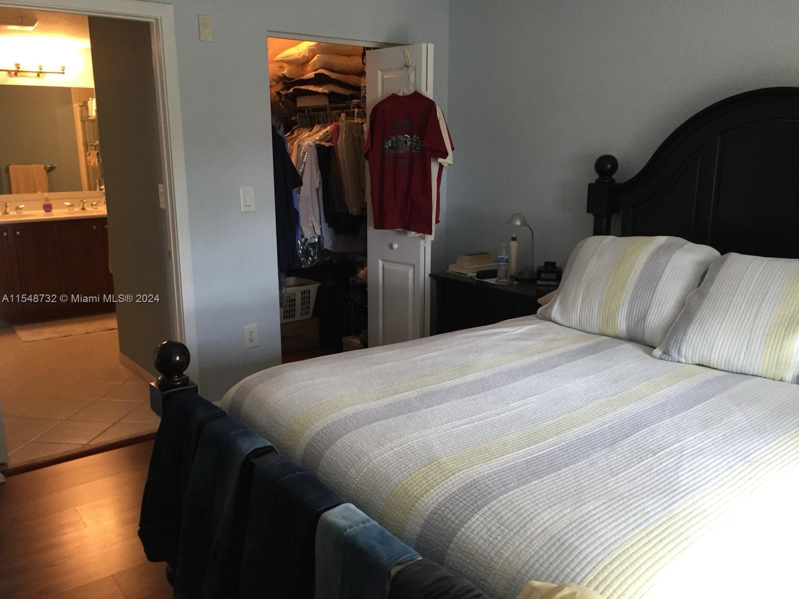 Kendall Miami, FL 33176 - Photo 9 of 15 a bedroom with a bed and a closet