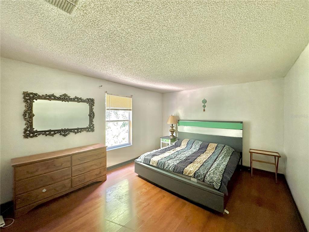 1225 Stone Harbour Road Winter Springs, FL 32708 - Photo 23 of 23 a living room with furniture and a flat screen tv