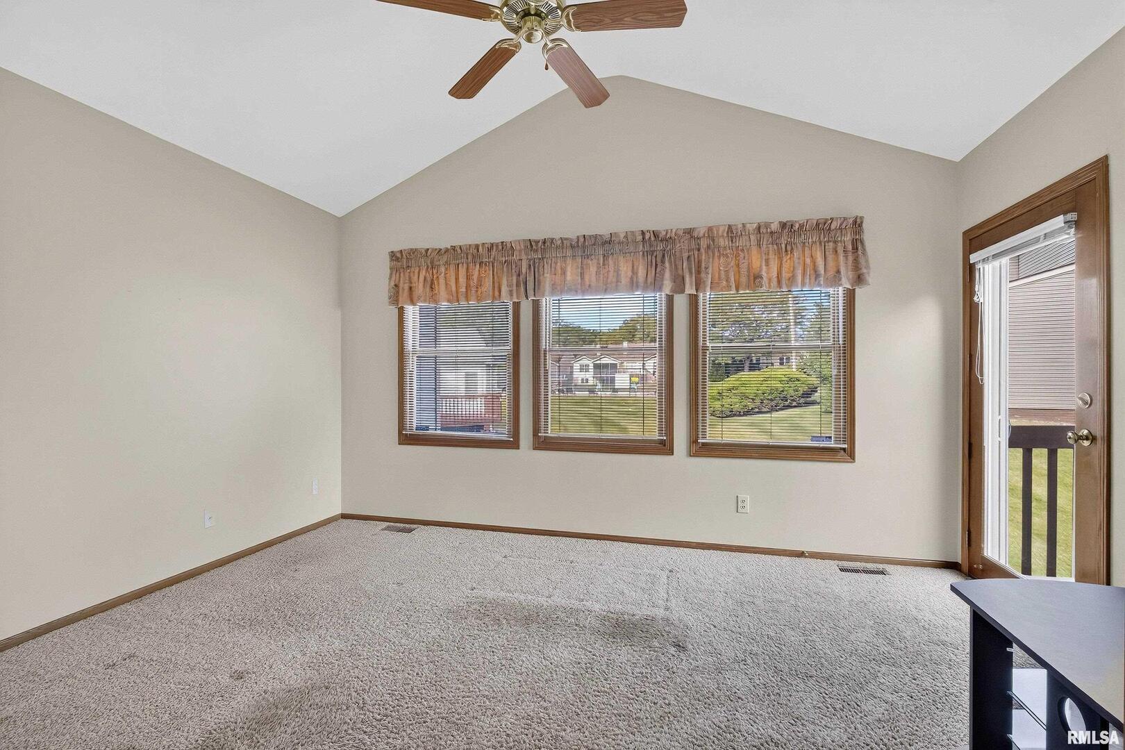 3988 Partridge Circle Bettendorf, IA 52722 - Photo 14 of 42 an empty room with windows