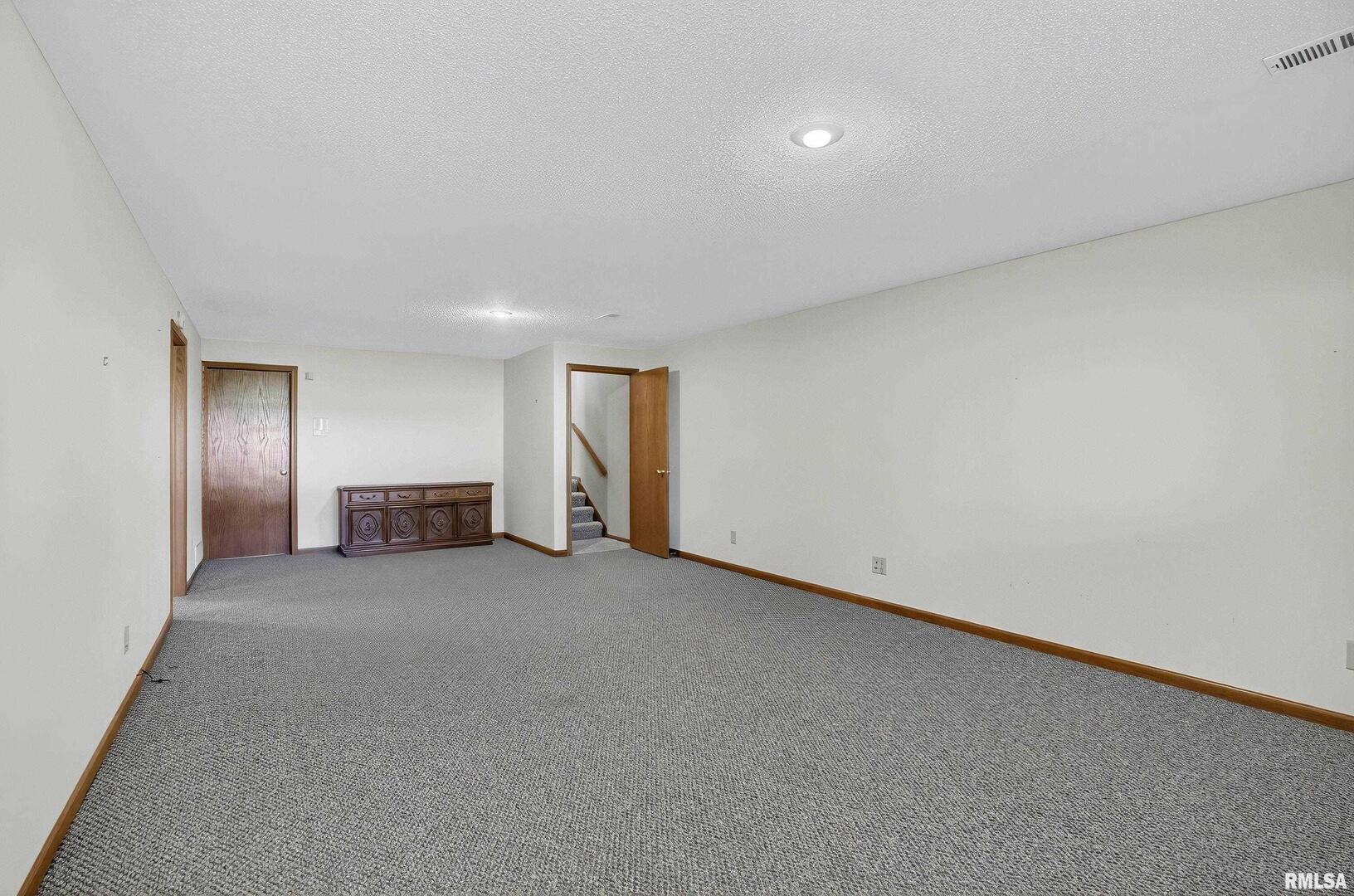 3988 Partridge Circle Bettendorf, IA 52722 - Photo 34 of 42 a view of an empty room
