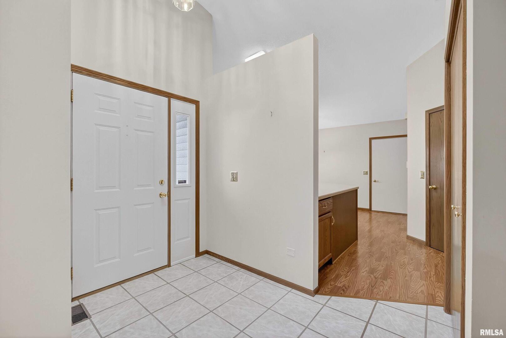 3988 Partridge Circle Bettendorf, IA 52722 - Photo 5 of 42 a view of a hallway with bathroom