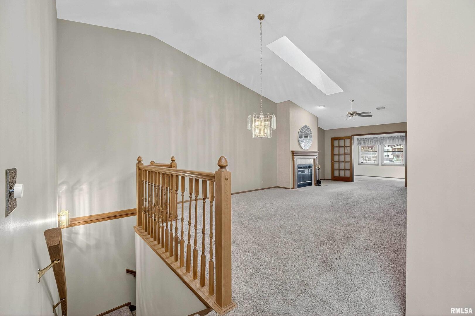 3988 Partridge Circle Bettendorf, IA 52722 - Photo 6 of 42 a view of a hallway with seating area
