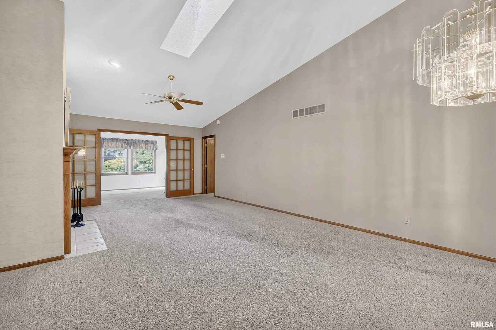 3988 Partridge Circle Bettendorf, IA 52722 - Photo 8 of 42 a view of an empty room with a window