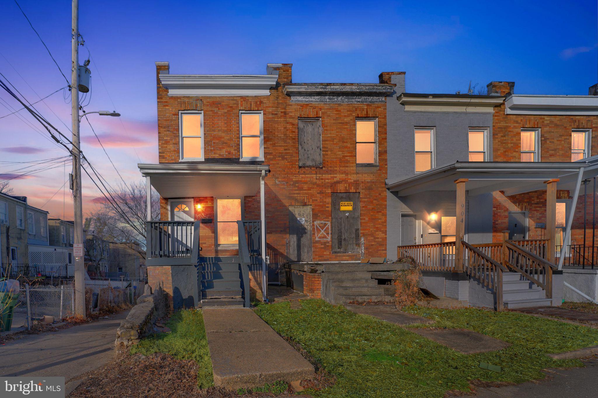 900 North Franklintown Road Baltimore, MD 21216 - Photo 1 of 16 a view of a building with a yard