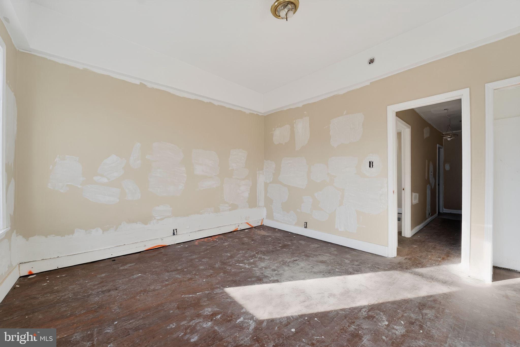 900 North Franklintown Road Baltimore, MD 21216 - Photo 14 of 16 an empty room with an empty space