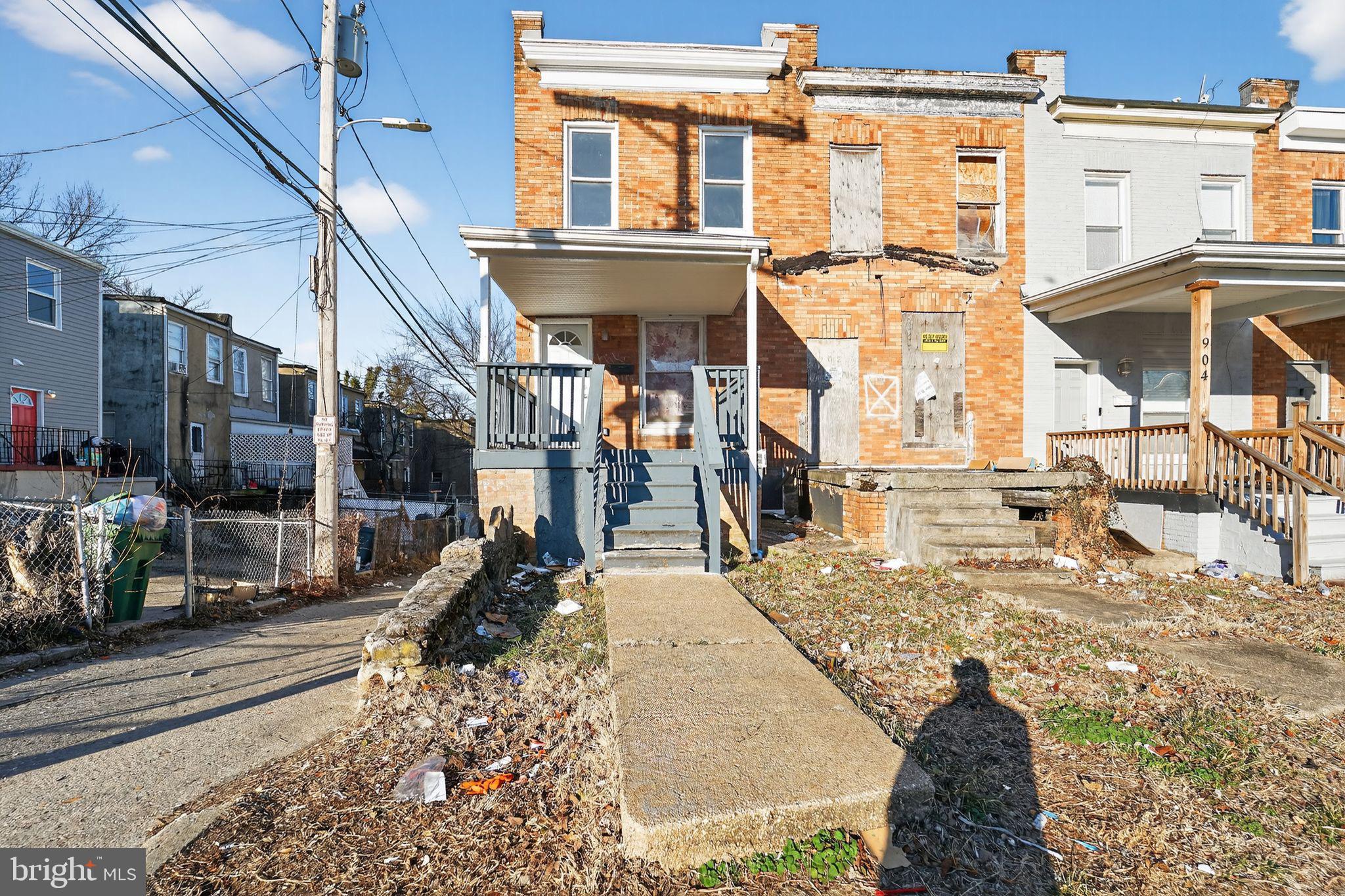 900 North Franklintown Road Baltimore, MD 21216 - Photo 2 of 16 a view of a building with many windows