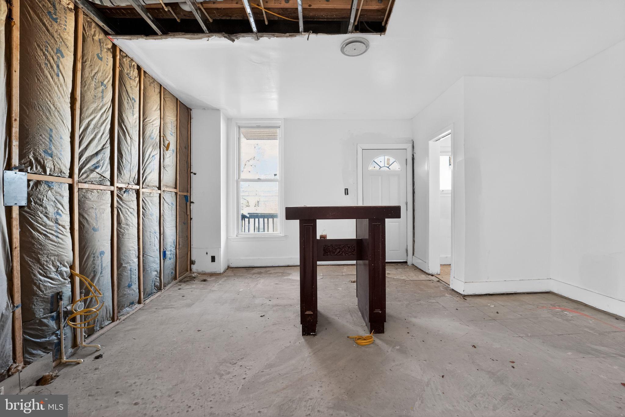 900 North Franklintown Road Baltimore, MD 21216 - Photo 8 of 16 a view of a hallway with stairs