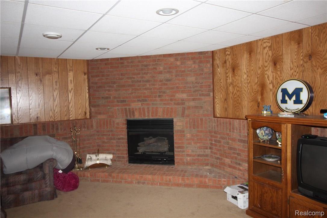 66200 Wolcott Road Ray, MI 48096 - Photo 31 of 32 WOLCOTT BASEMENT FIREPLACE.jpg