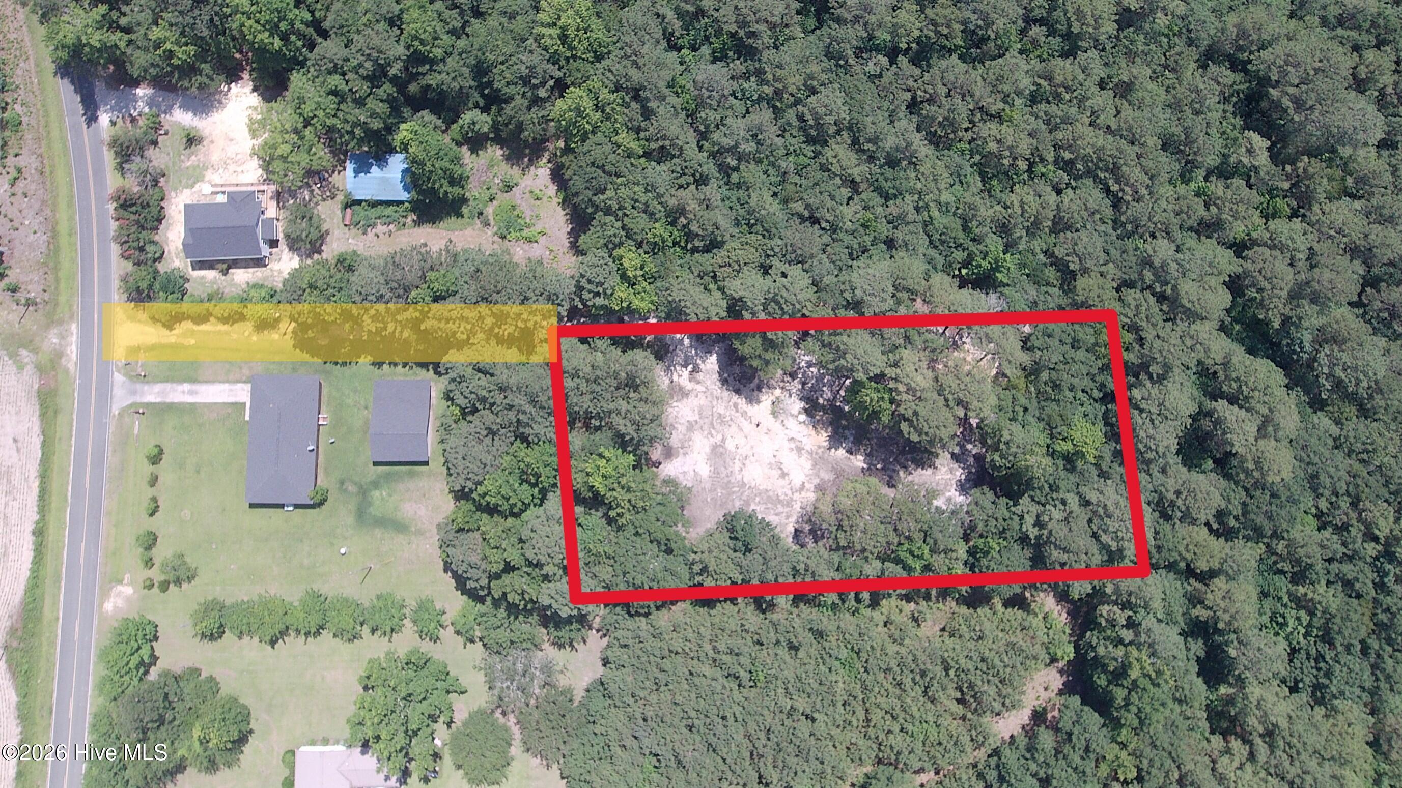 1104 Quill Moore Road Clarkton, NC 28433 - Photo 2 of 3 Lot lines are approximate; yellow highlight noting easement