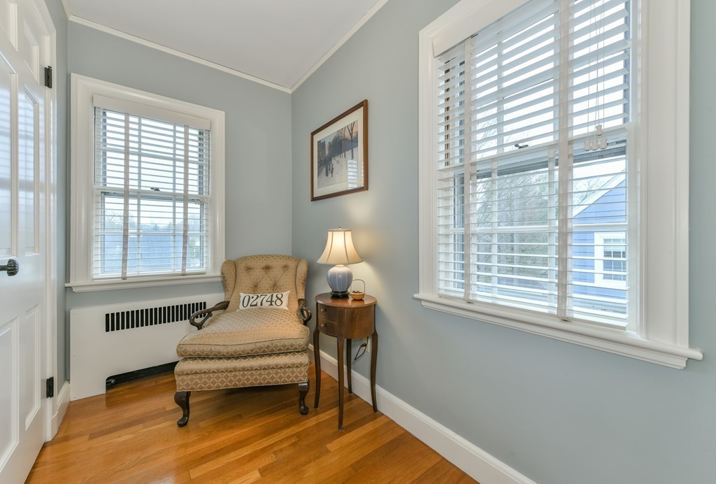47 Standish Road Milton, MA 02186 - Photo 15 of 23 a bedroom with a window and a chair