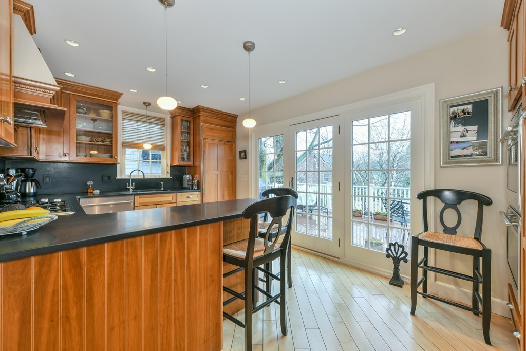 47 Standish Road Milton, MA 02186 - Photo 8 of 23 a view of a kitchen with furniture and large windows