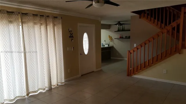 a view of a garage with stairs