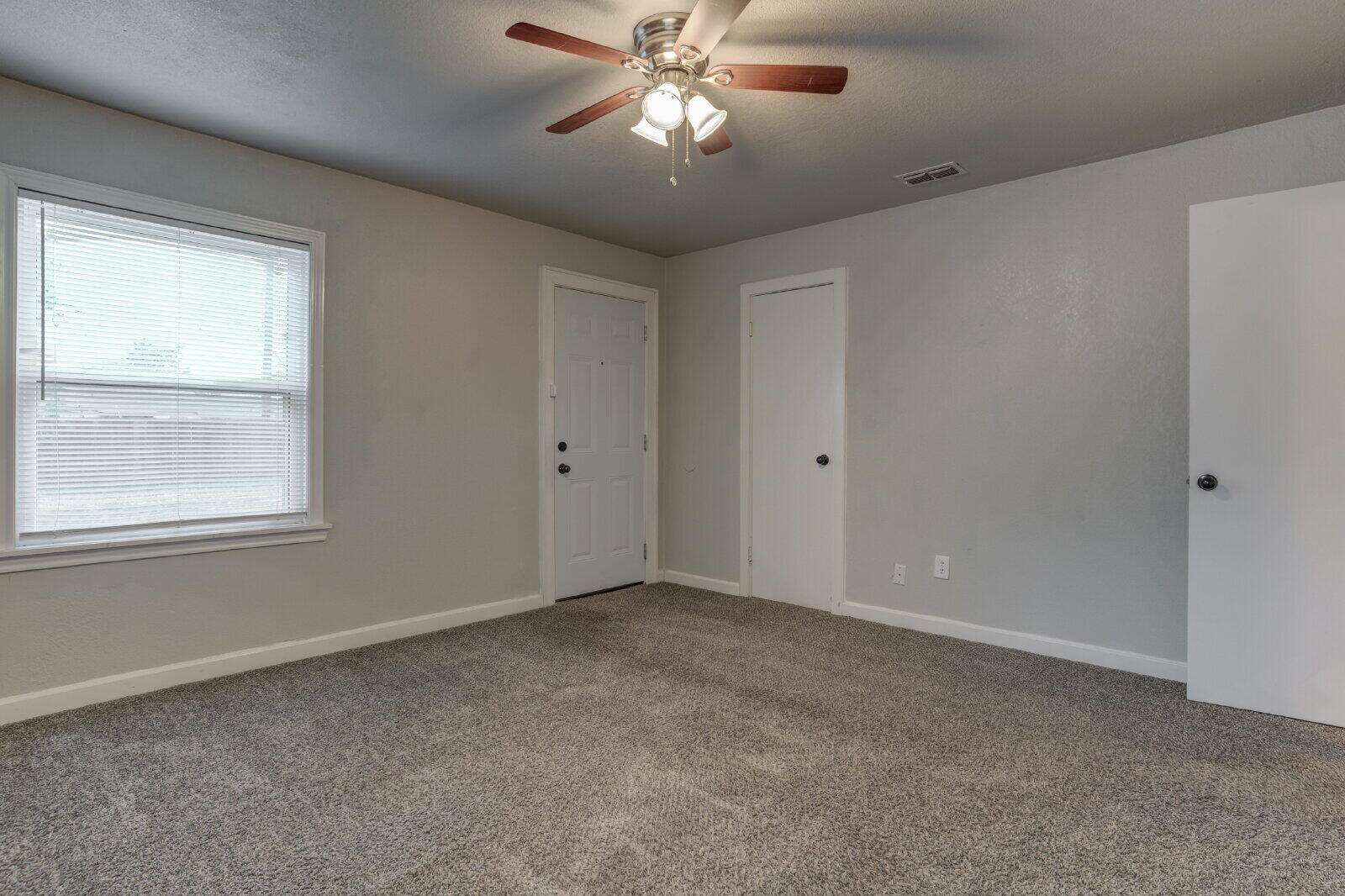 3415 27th Street Lubbock, TX 79410 - Photo 24 of 30 a view of an empty room with a window