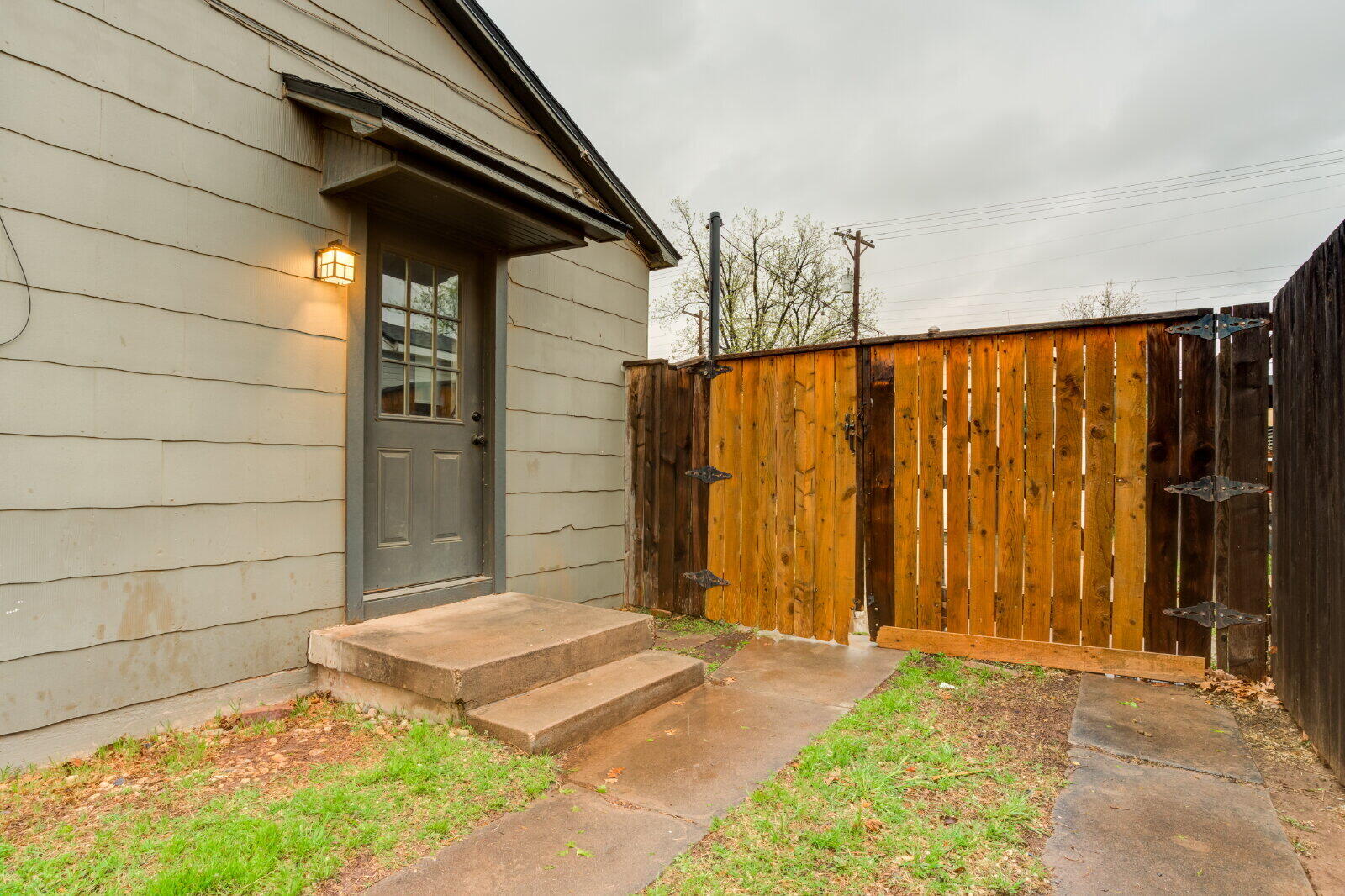 3415 27th Street Lubbock, TX 79410 - Photo 27 of 30 a view of a back yard from a room