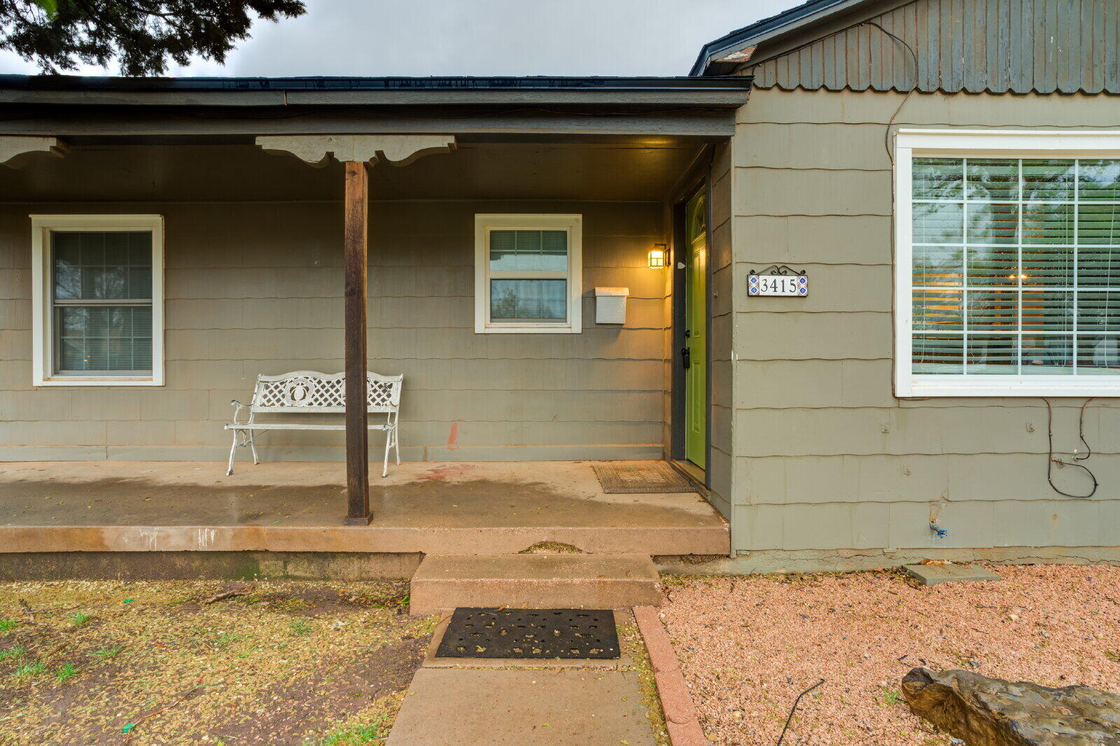 3415 27th Street Lubbock, TX 79410 - Photo 3 of 30 a bathroom with a tub and shower