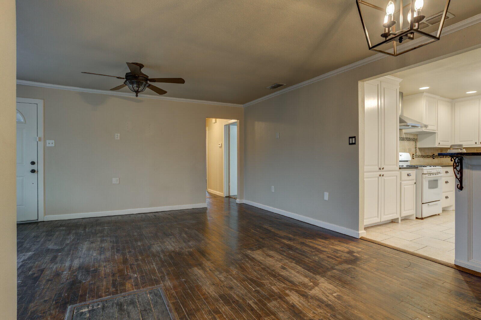 3415 27th Street Lubbock, TX 79410 - Photo 8 of 30 a view of a kitchen with a sink and cabinets