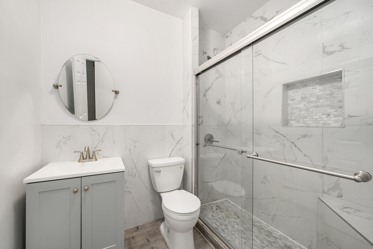 497 Decatur Street Brooklyn, NY 11233 - Photo 12 of 21 a bathroom with a toilet sink and shower