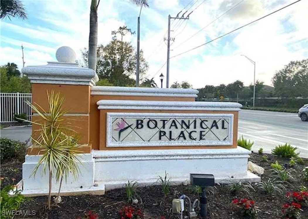 4450 Botanical Pl Circle, Unit 6 Naples, FL 34112 - Photo 33 of 33 a sign on the side of a building