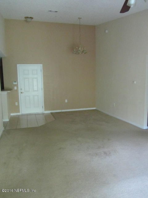 7920 Merrill Road, Unit 2016 Jacksonville, FL 32277 - Photo 3 of 17 a view of a room with an empty space