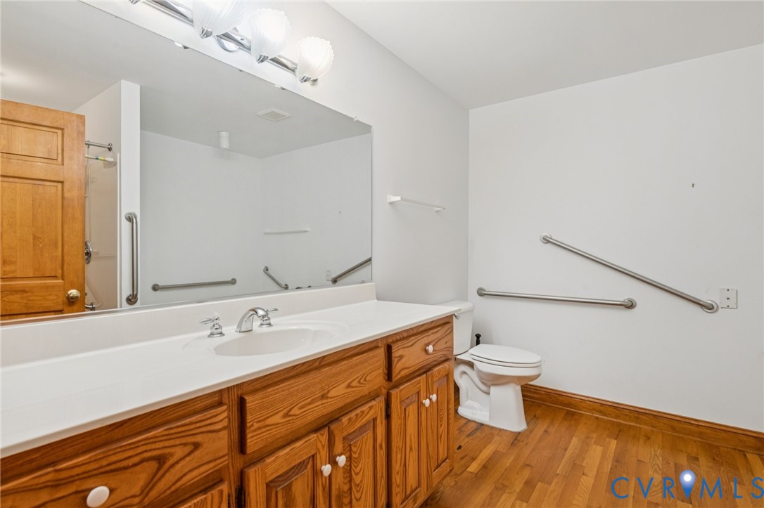 542 Ampthill Road Cartersville, VA 23027 - Photo 13 of 43 The primary bath is handicap equipped with a curbl