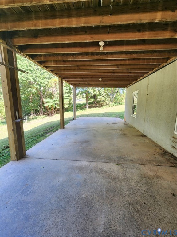 542 Ampthill Road Cartersville, VA 23027 - Photo 36 of 43 This could be used as a carport as the driveway le