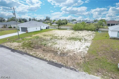 a view of a lake with a building in the background
