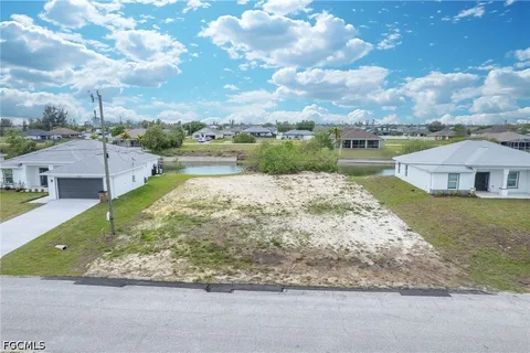 a view of a lake with a yard