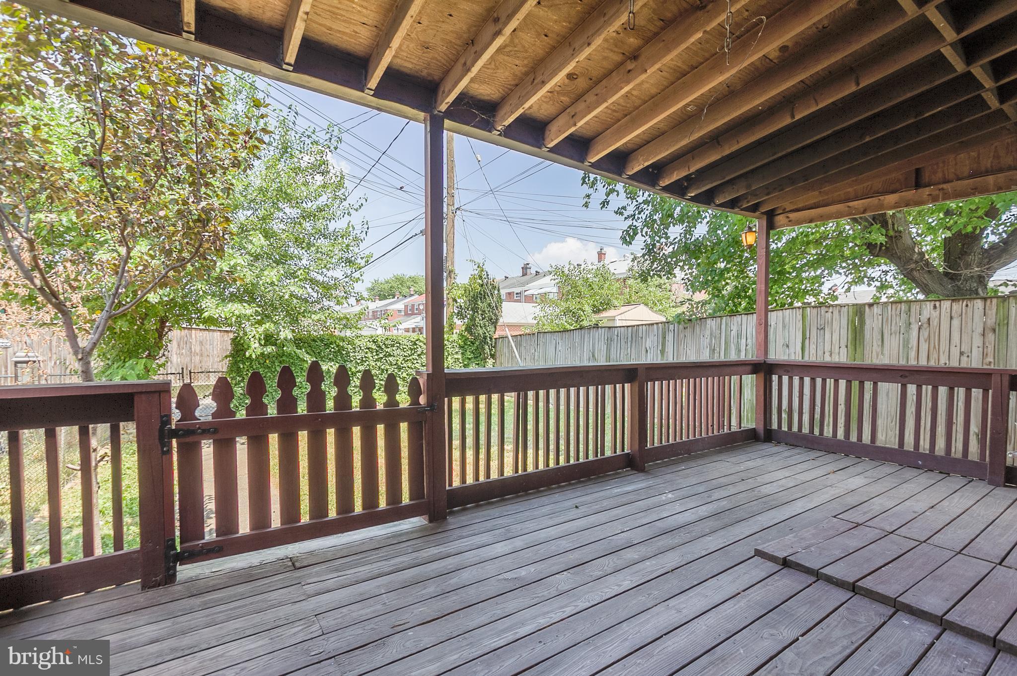 2806 Kirkleigh Road Baltimore, MD 21222 - Photo 8 of 10 a view of a wooden deck