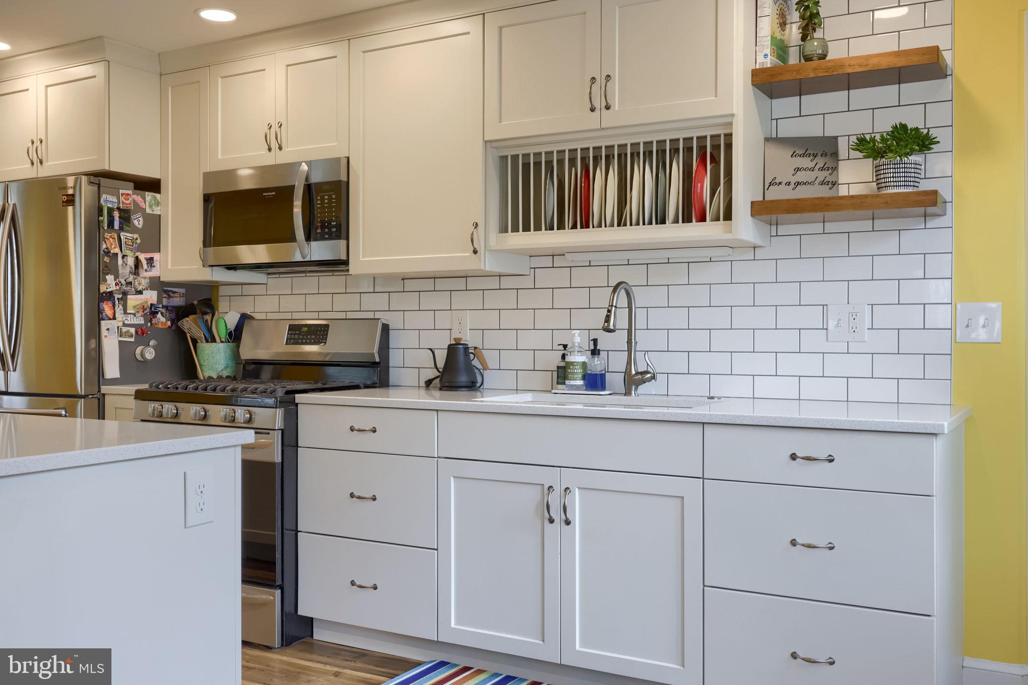 9 Haskell Drive Lancaster, PA 17601 - Photo 12 of 32 a kitchen with stainless steel appliances white cabinets and a sink
