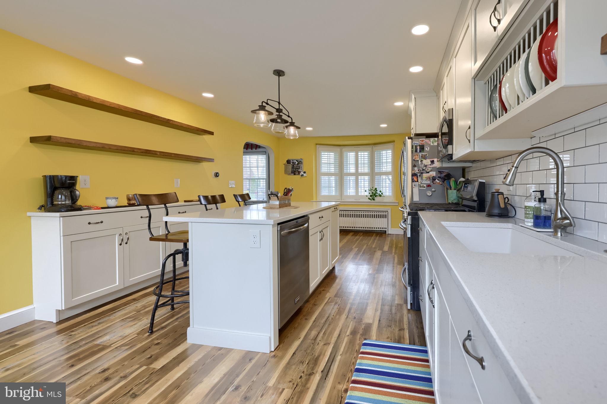 9 Haskell Drive Lancaster, PA 17601 - Photo 17 of 32 a kitchen with cabinets and wooden floor