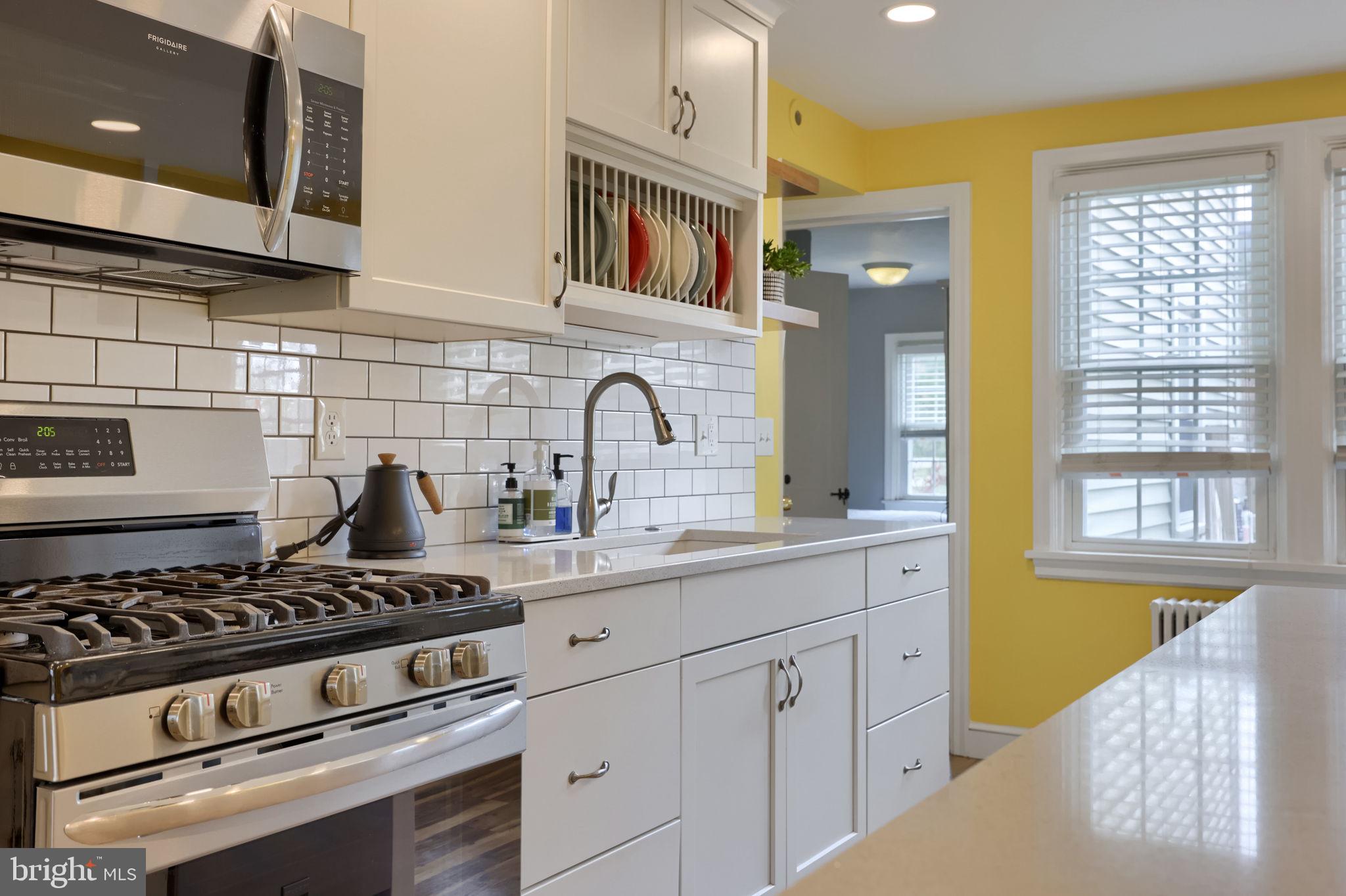 9 Haskell Drive Lancaster, PA 17601 - Photo 18 of 32 a kitchen with stainless steel appliances granite countertop a stove and a sink