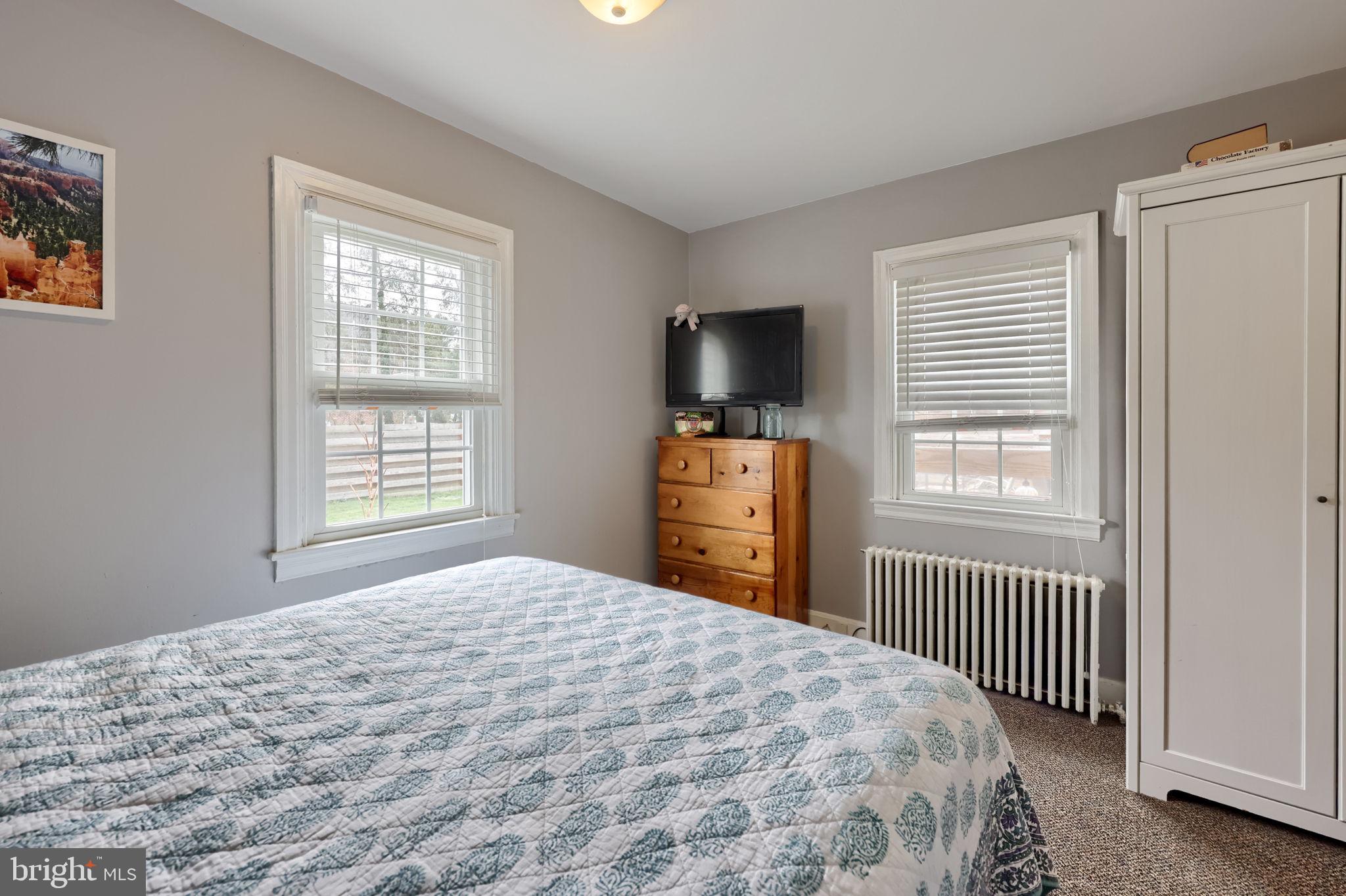 9 Haskell Drive Lancaster, PA 17601 - Photo 23 of 32 a bedroom with a bed and a flat screen tv