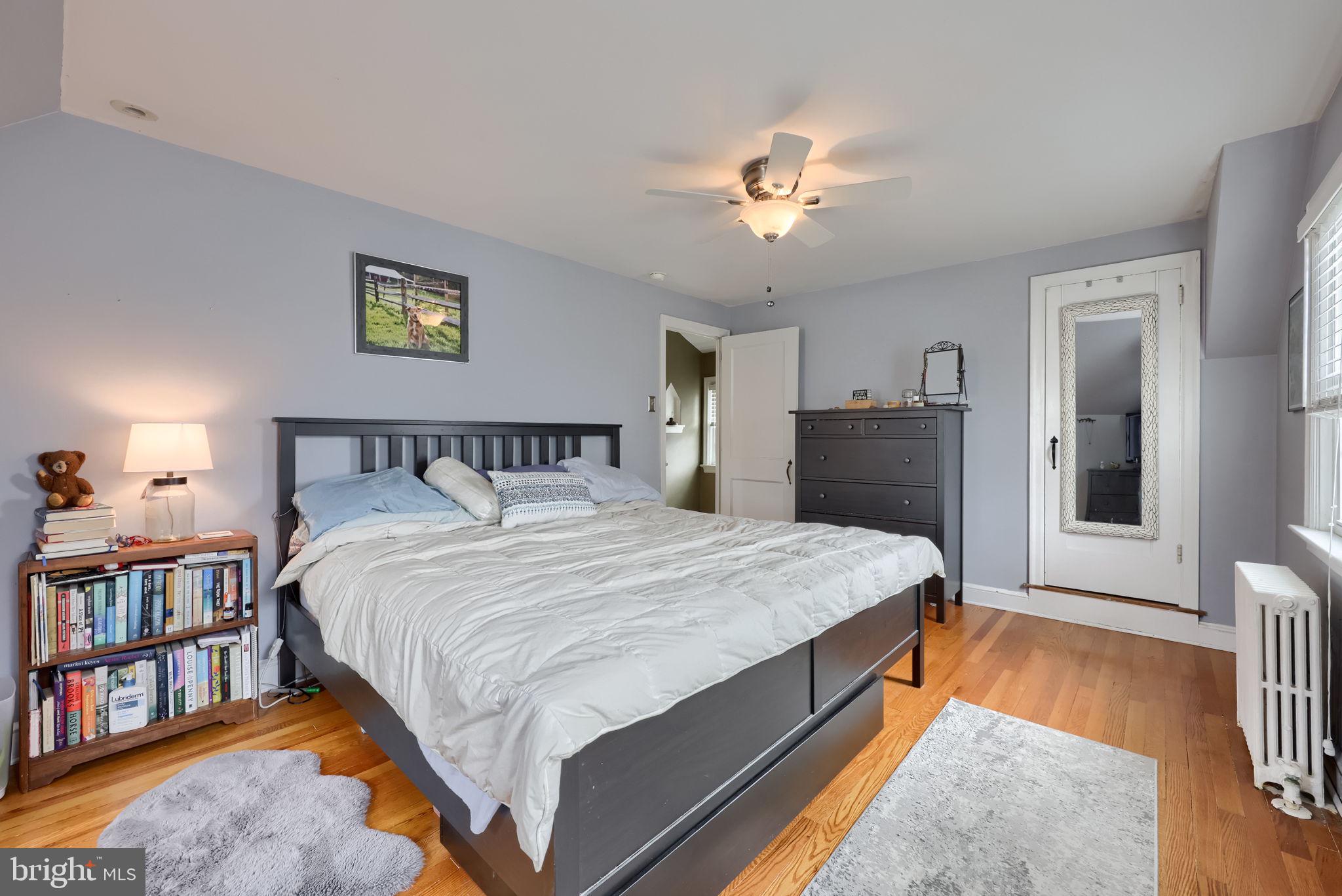 9 Haskell Drive Lancaster, PA 17601 - Photo 24 of 32 a bedroom with a bed and a chandelier