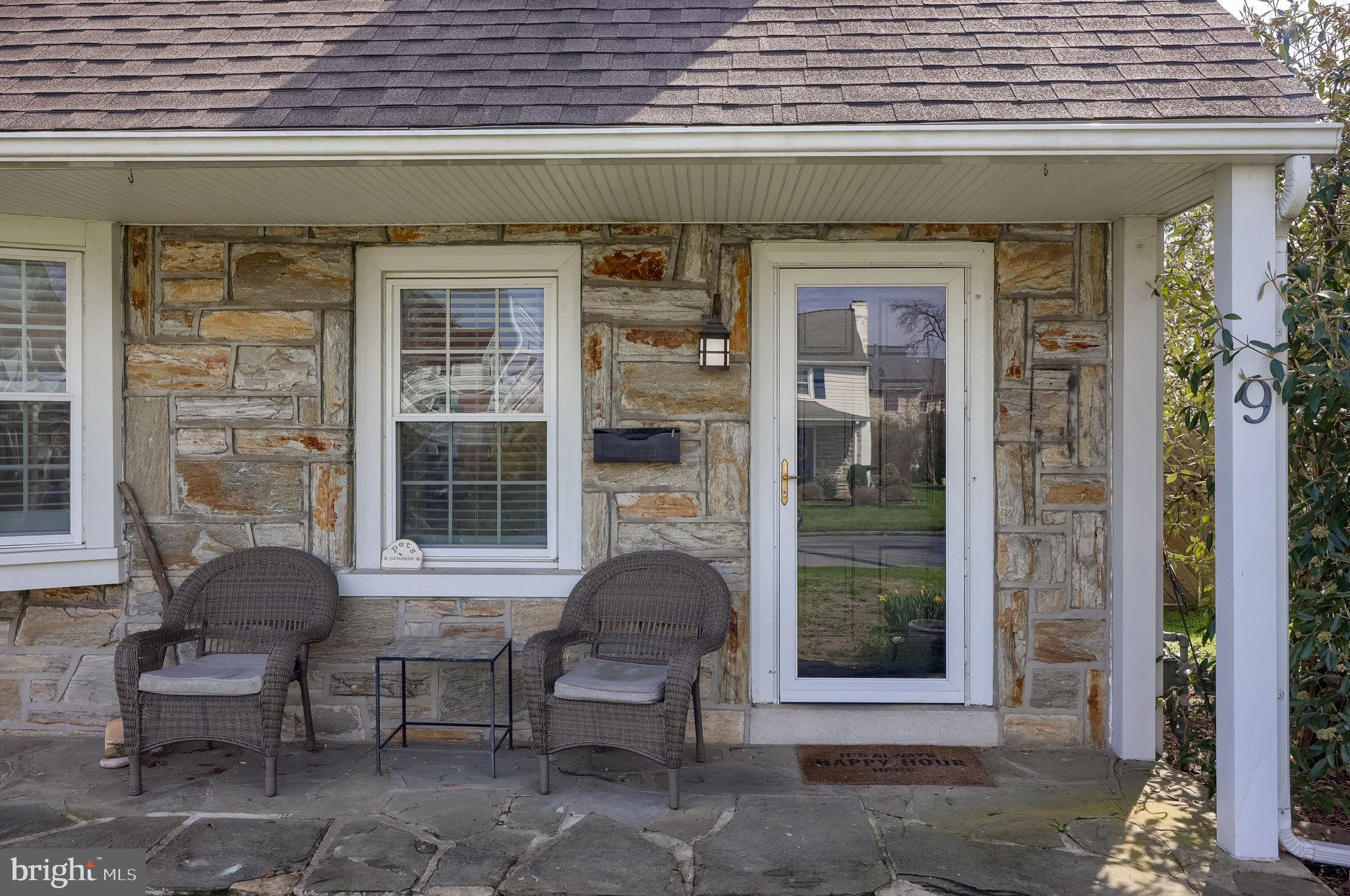 9 Haskell Drive Lancaster, PA 17601 - Photo 5 of 32 a front view of a house with outdoor seating and a potted plant