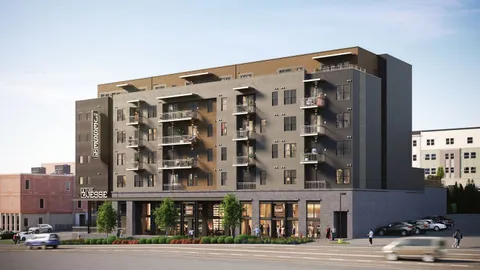 a front view of a building with a street