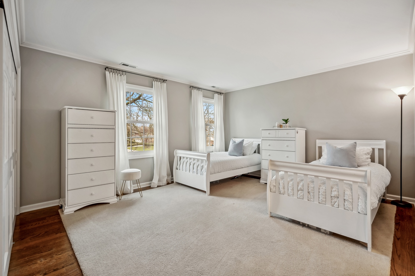 2002 Brandon Road Glenview, IL 60025 - Photo 19 of 37 a living room with furniture and a dresser