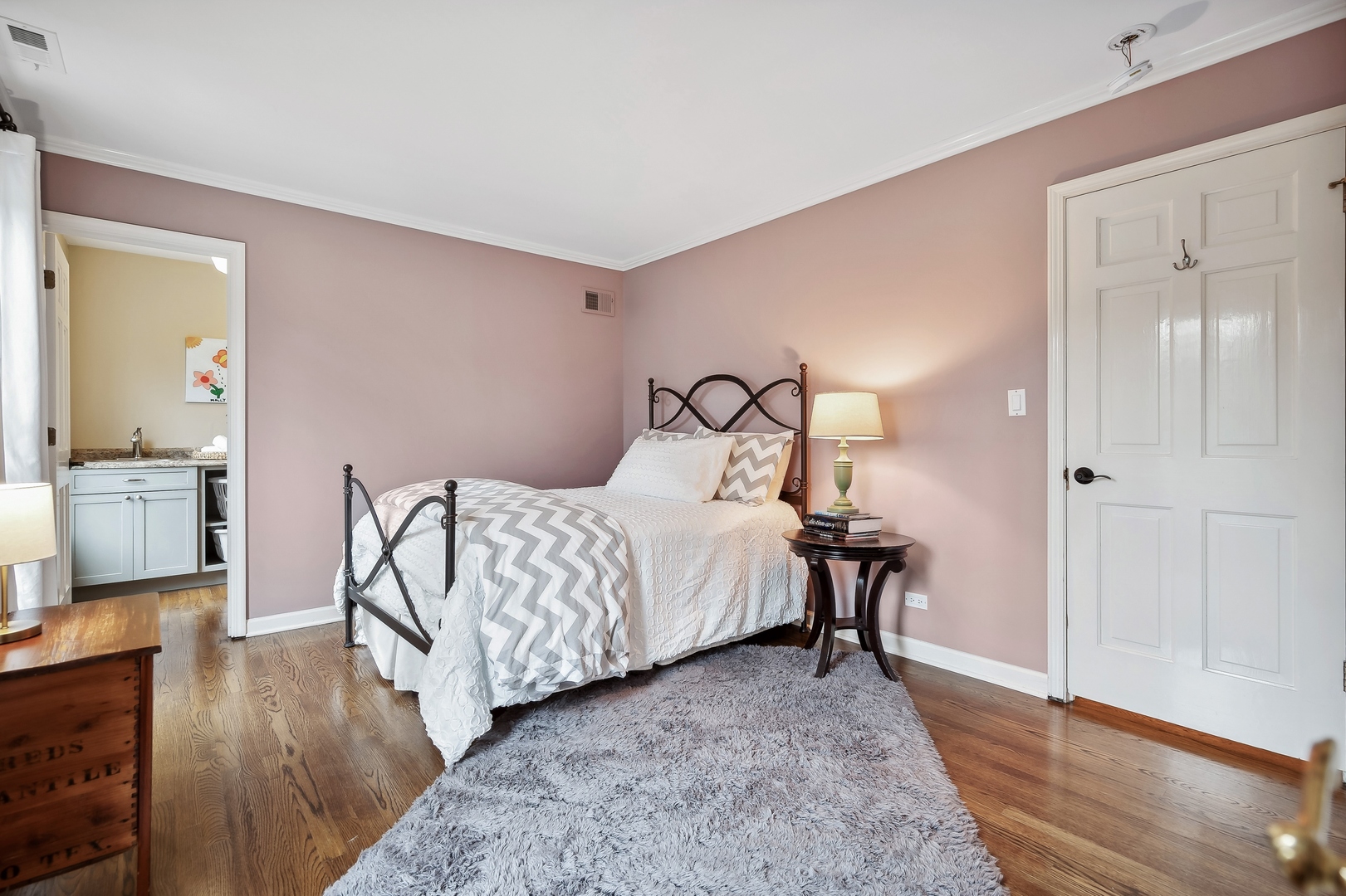 2002 Brandon Road Glenview, IL 60025 - Photo 22 of 37 a bedroom with a bed and wooden floor
