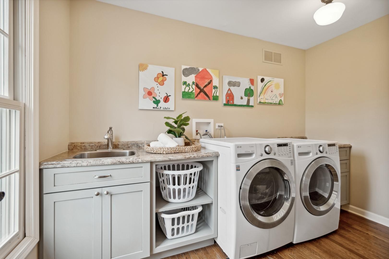 2002 Brandon Road Glenview, IL 60025 - Photo 23 of 37 a utility room with dryer and washer