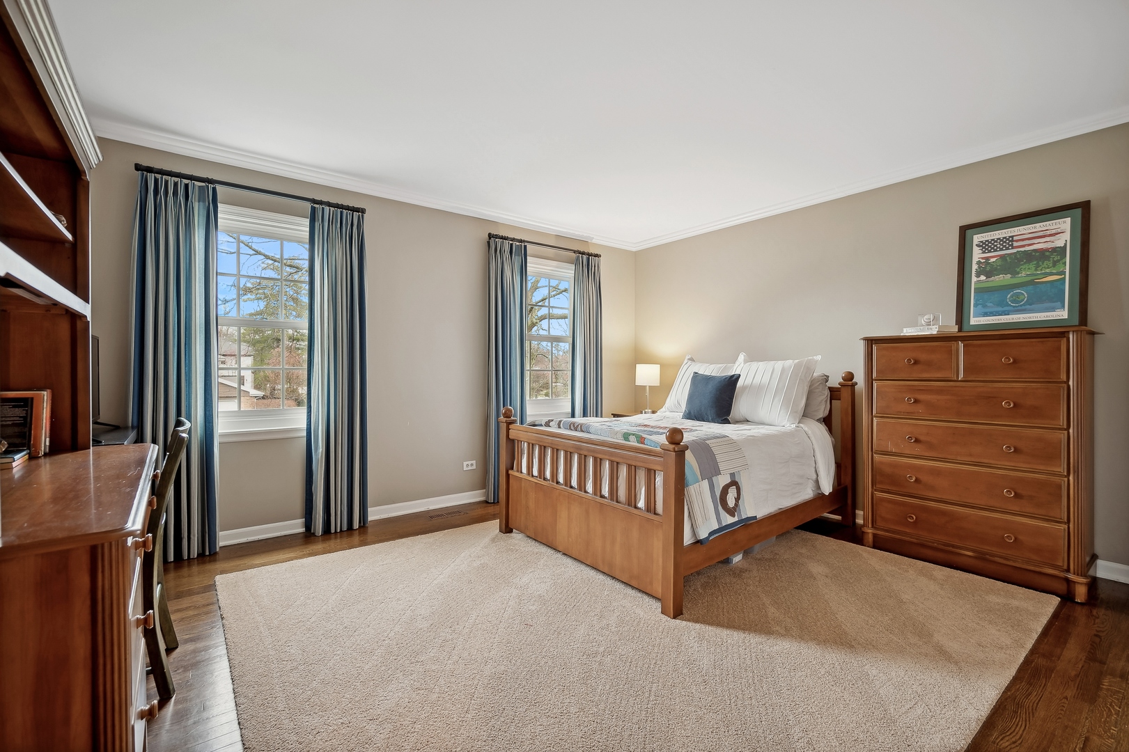 2002 Brandon Road Glenview, IL 60025 - Photo 24 of 37 a bedroom with a bed and a dresser