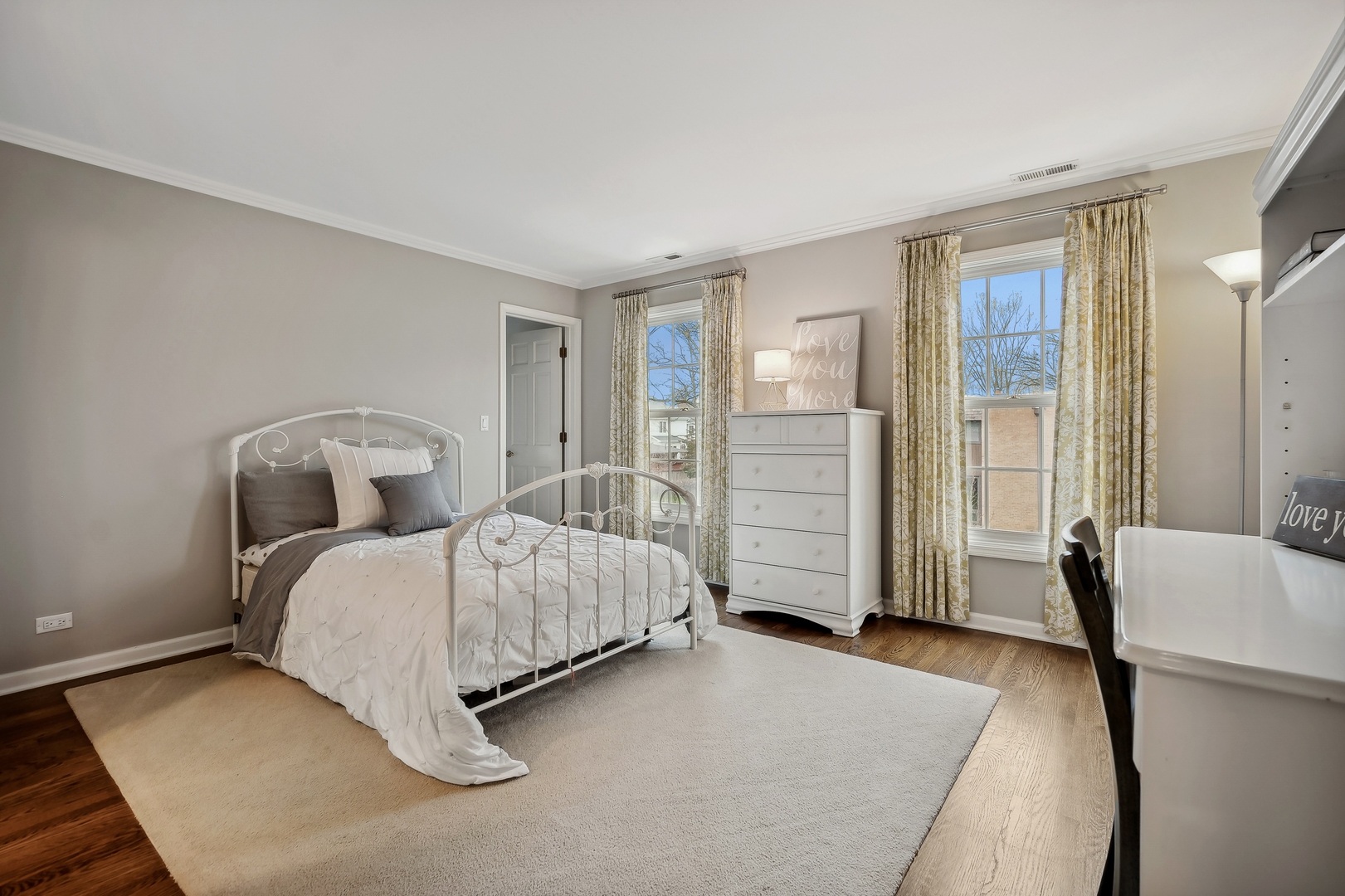 2002 Brandon Road Glenview, IL 60025 - Photo 25 of 37 a spacious bedroom with a bed and walk in closet