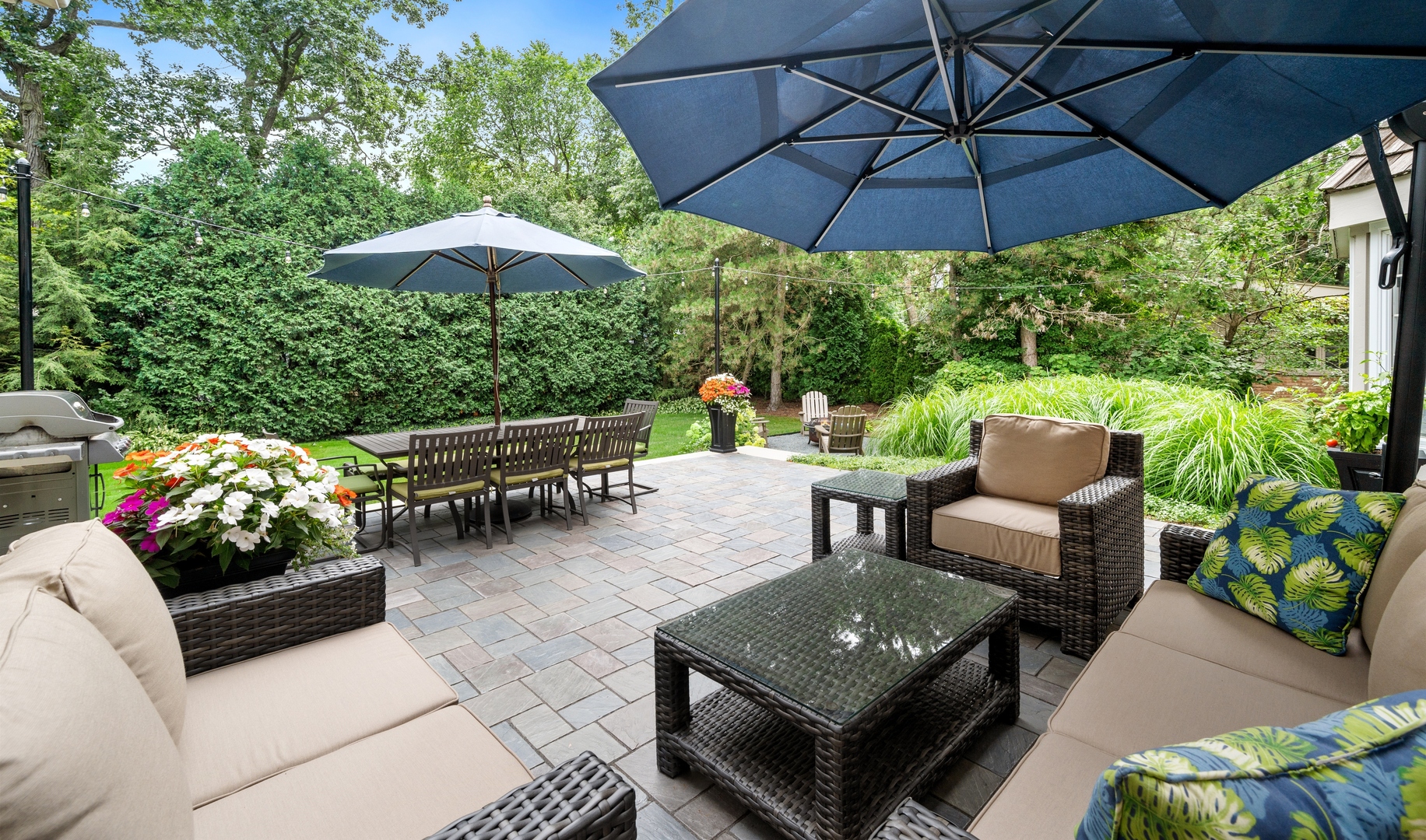 2002 Brandon Road Glenview, IL 60025 - Photo 30 of 37 a view of a tables and chairs under an umbrella in patio