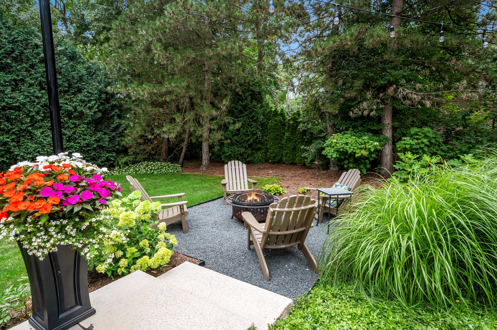 2002 Brandon Road Glenview, IL 60025 - Photo 32 of 37 a backyard of a house with outdoor seating