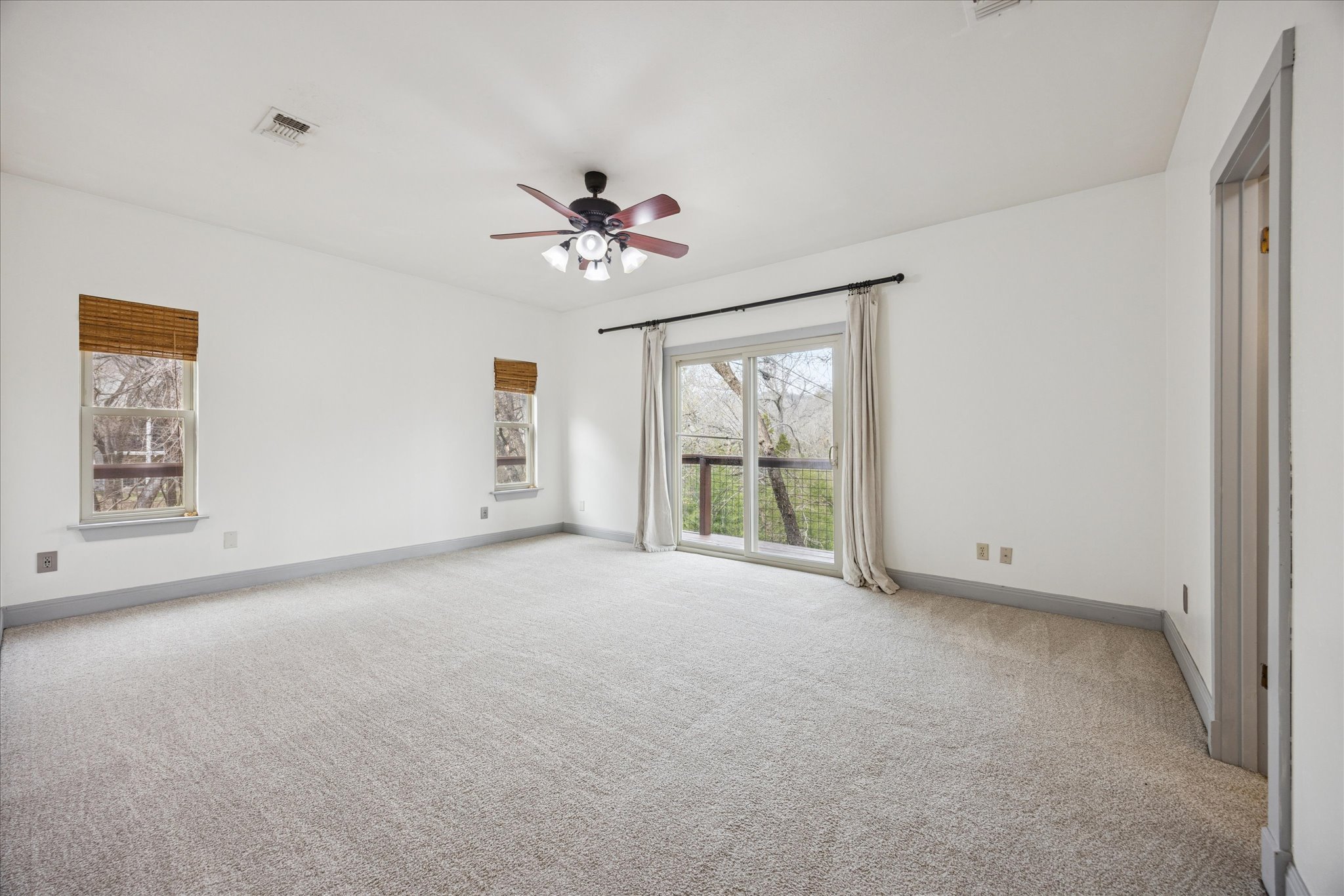 13918 Hummingbird Lane Austin, TX 78732 - Photo 13 of 32 a view of an empty room with a window