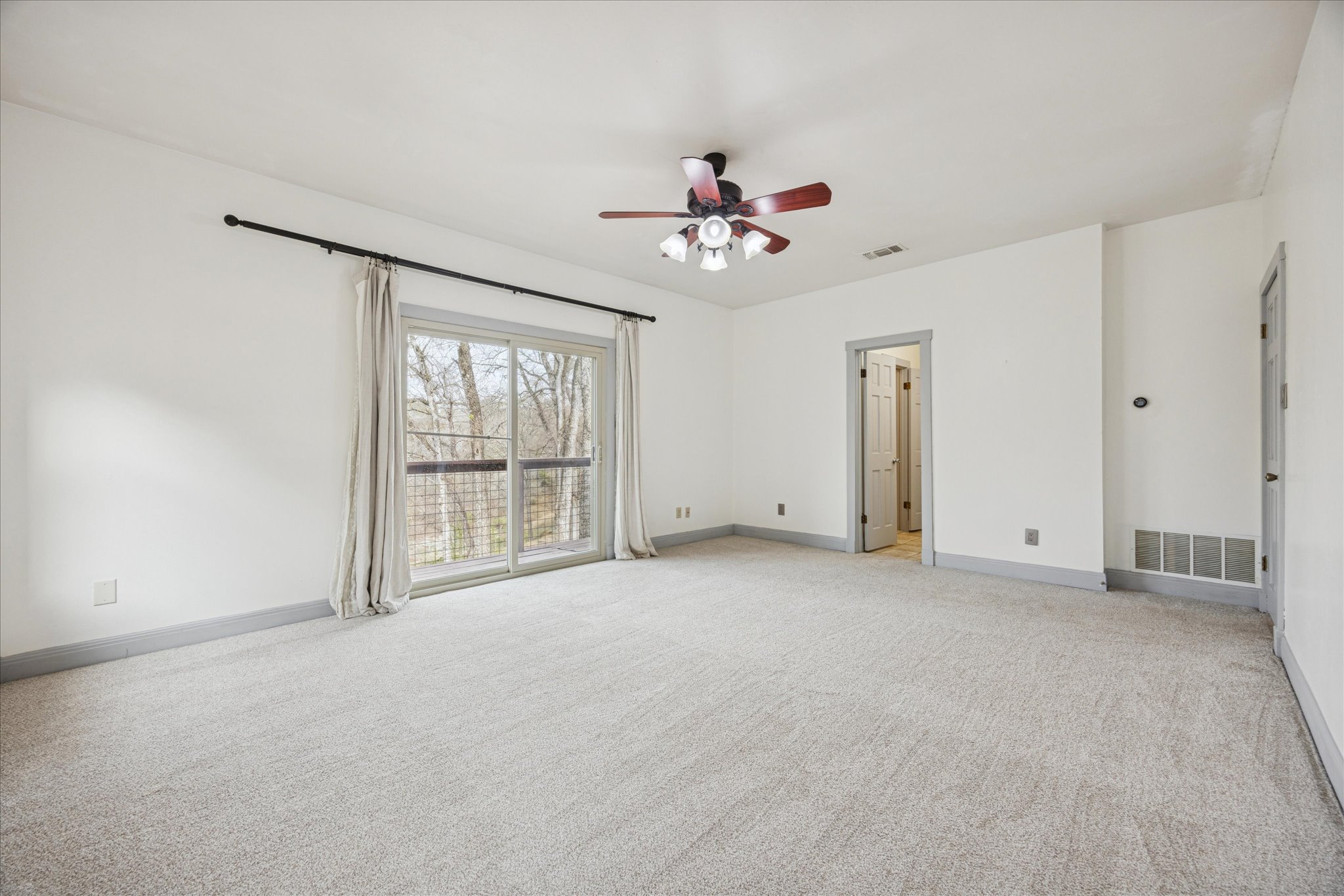 13918 Hummingbird Lane Austin, TX 78732 - Photo 14 of 32 a view of an empty room with a window